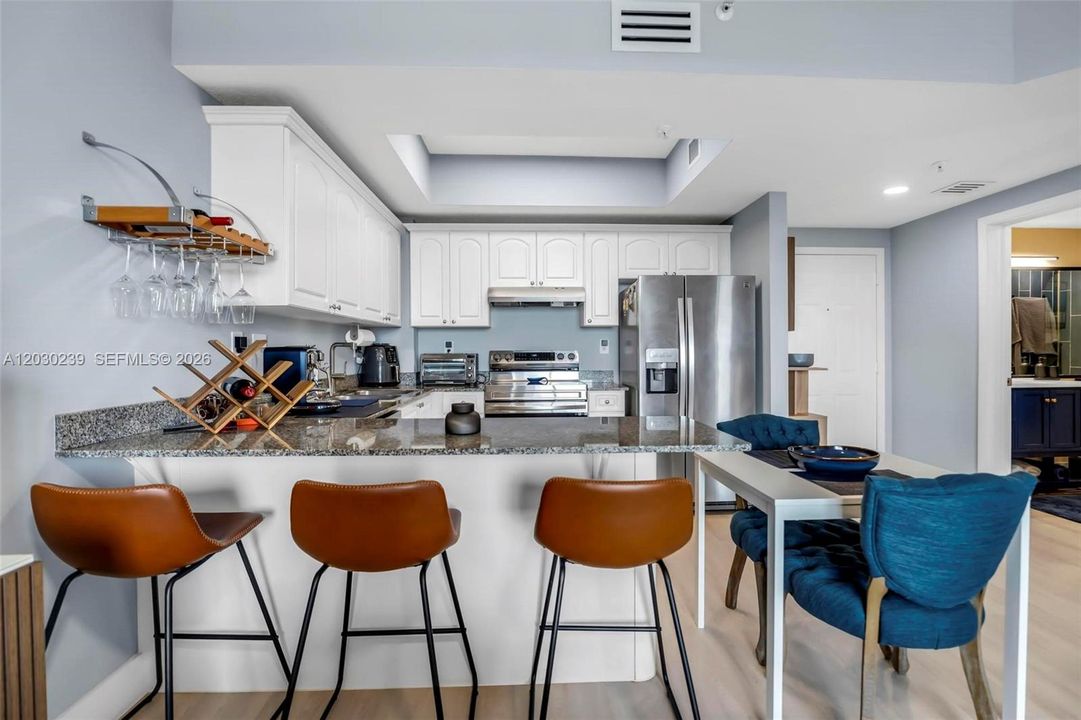 Modern kitchen bar with stylish contemporary stools.