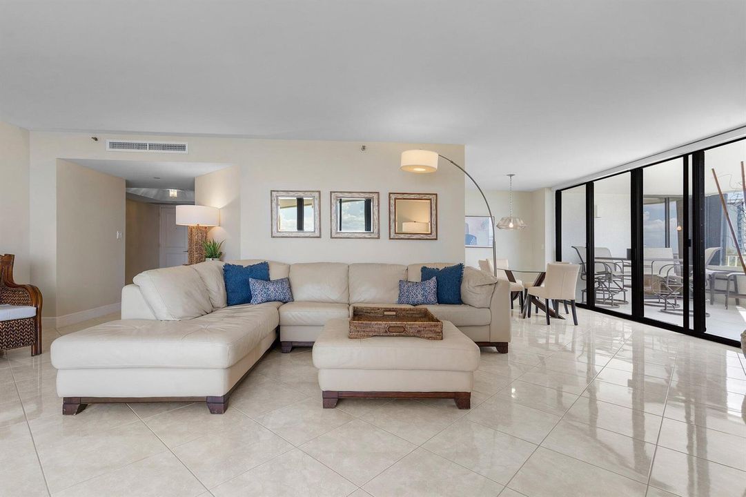 Tile throughout/leather sectional