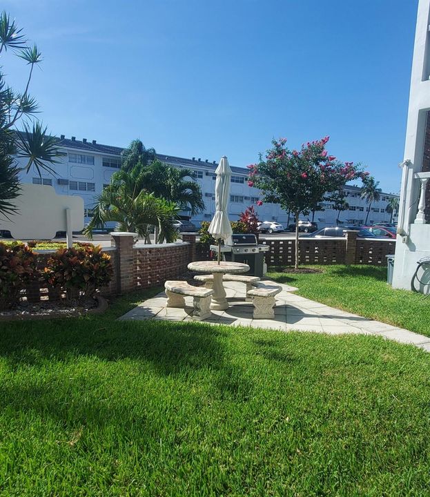 5203 Maybury 108B, bbq area near buildin