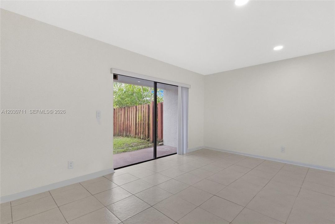sliding glass door to fenced yard