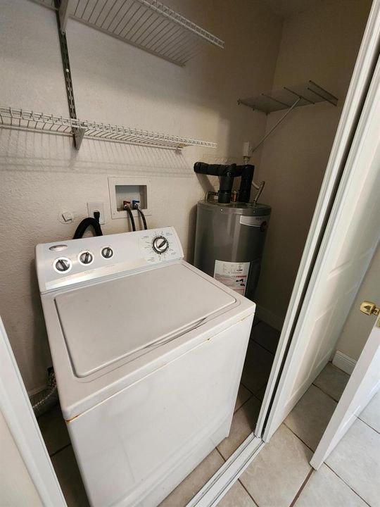 Washer and HWH in 3rd Bedroom closet