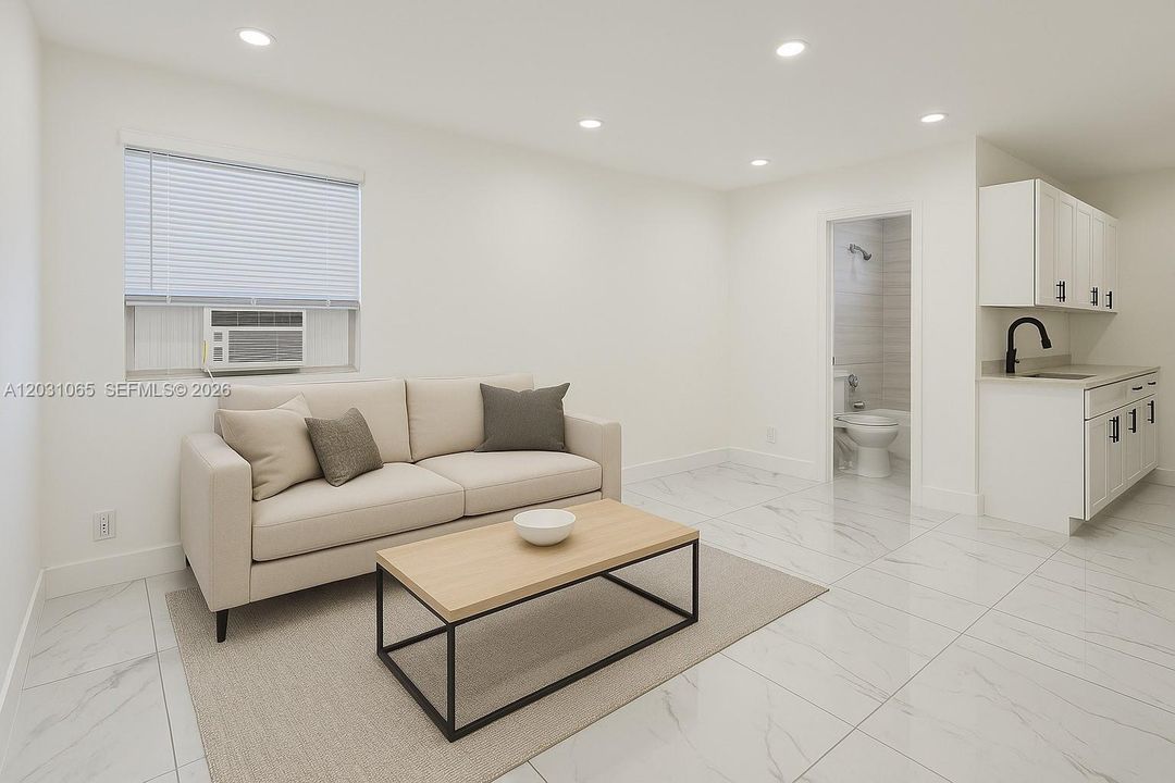 The unit is UNFURNISHED- This photo is VIRTUAL STAGED FOR VISUALIZATION