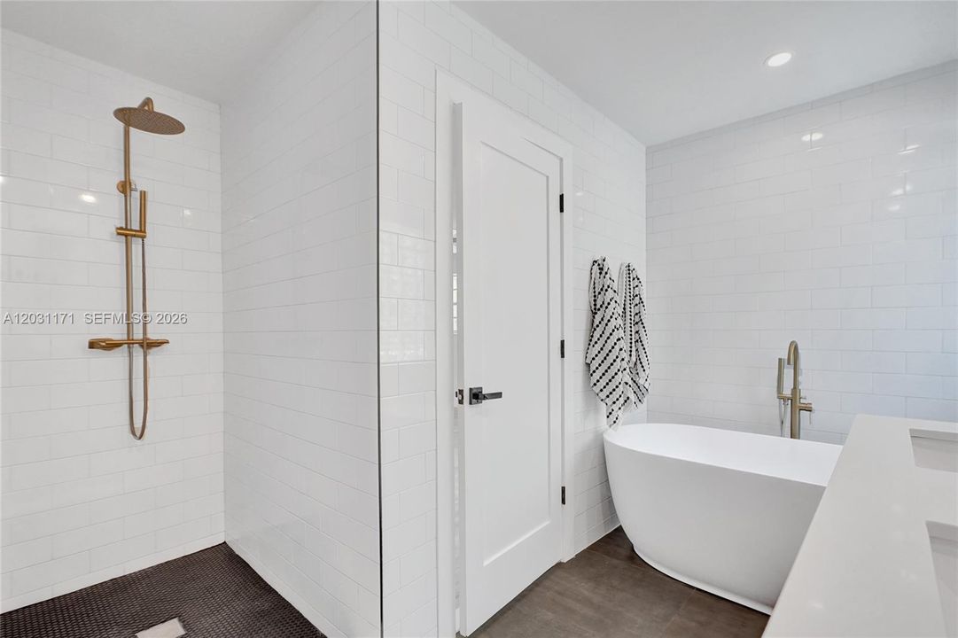 Master bedroom, bathroom, shower and tub