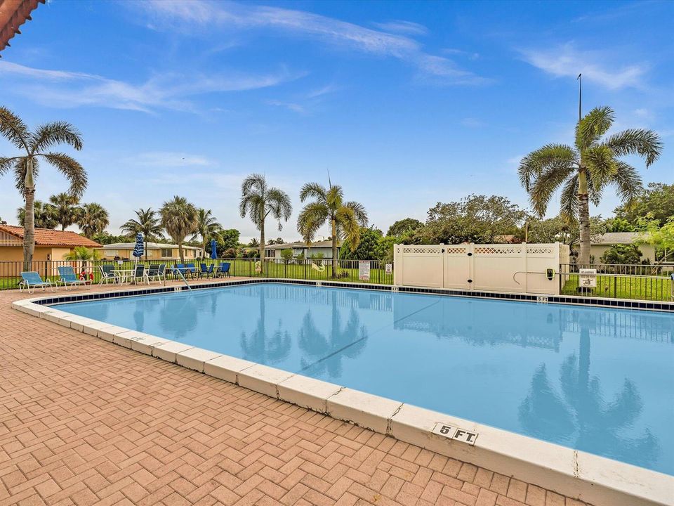 57-Community pool with home in center re