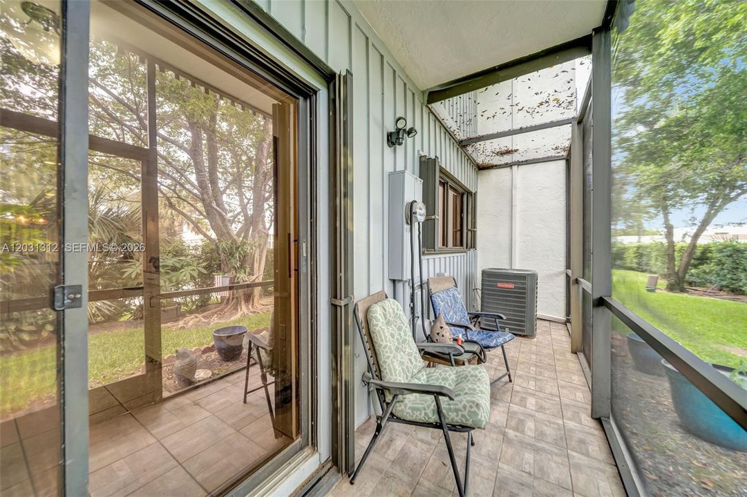 Screened enclosed back patio