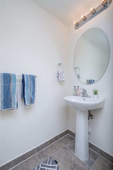 Half Bathroom with light sensors
