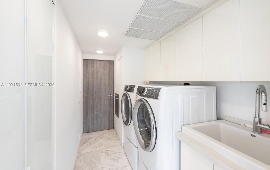Designated utility room for washer/dryer.