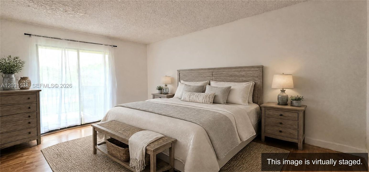 Master Bedroom overlooking balcony door.