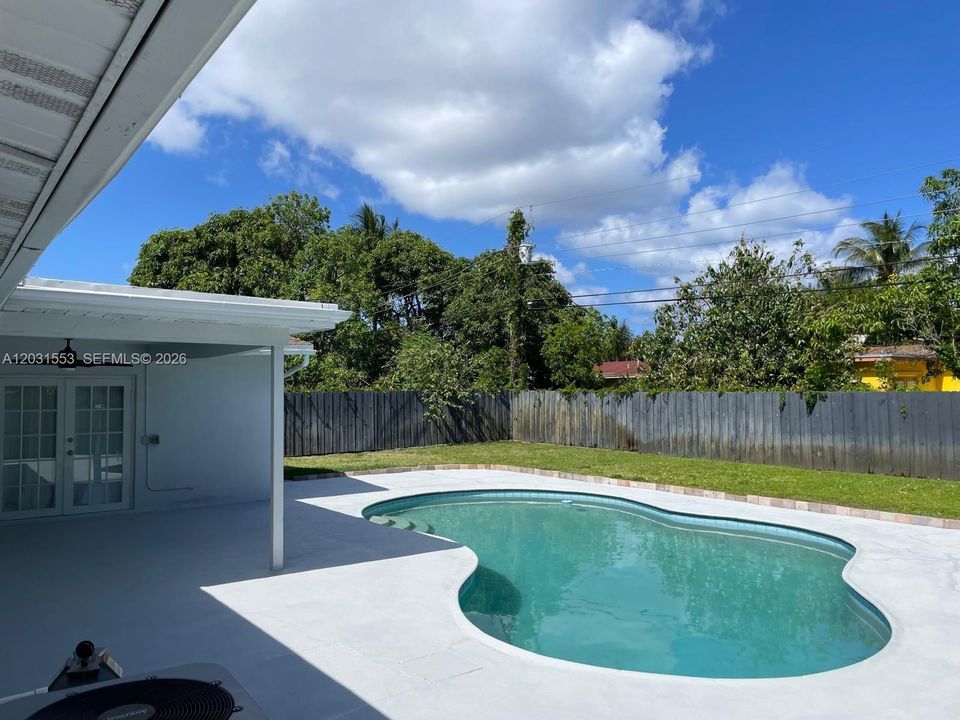 pool area and yard all Fence , fruit tree to the South side