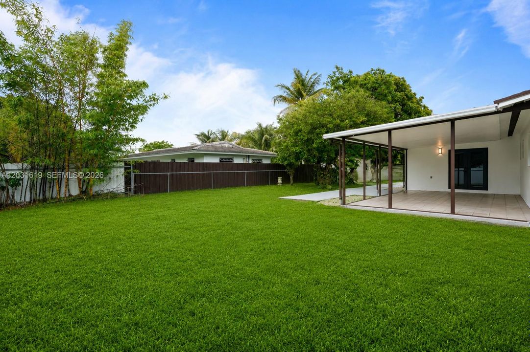 backyard pictures enhaced to look like synthetic grass
