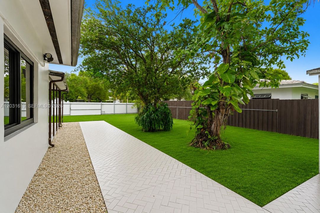 Backyard pictures enhaced to look like synthetic grass
