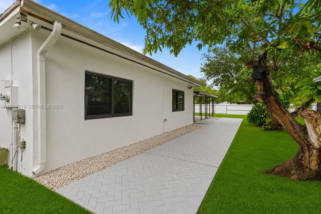 Backyard pictures enhaced to look like synthetic grass