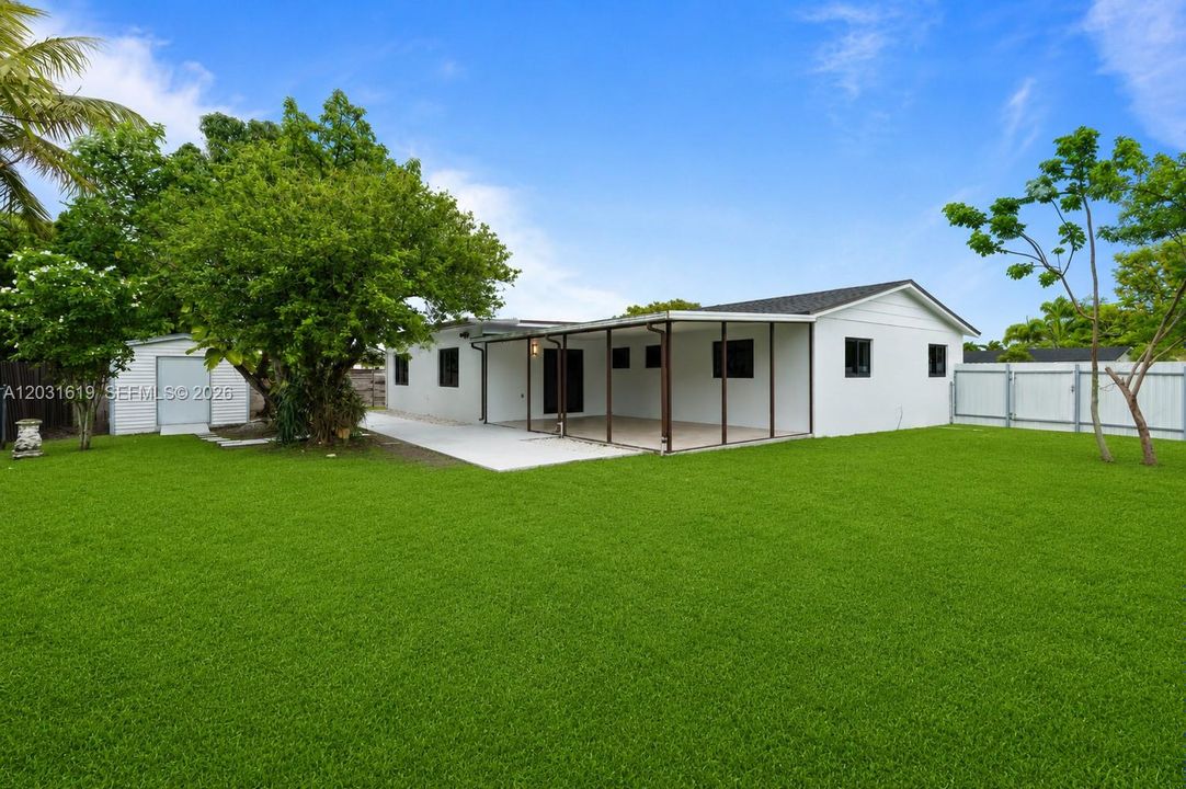 backyard pictures enhaced to look like synthetic grass