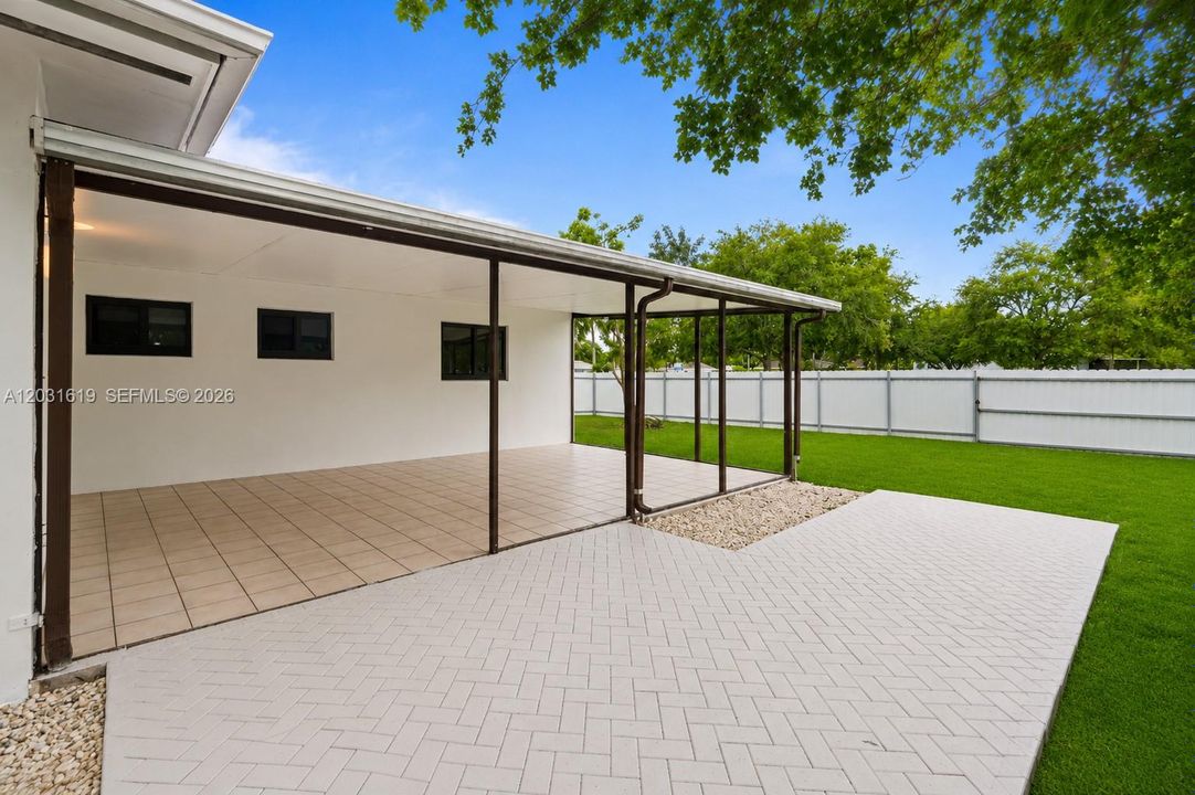 backyard pictures enhaced to look like synthetic grass