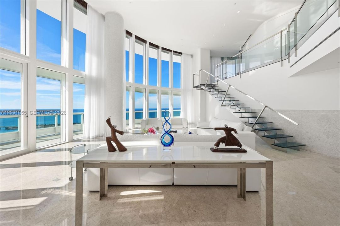Living Room with dramatic 20 ft. ceilings