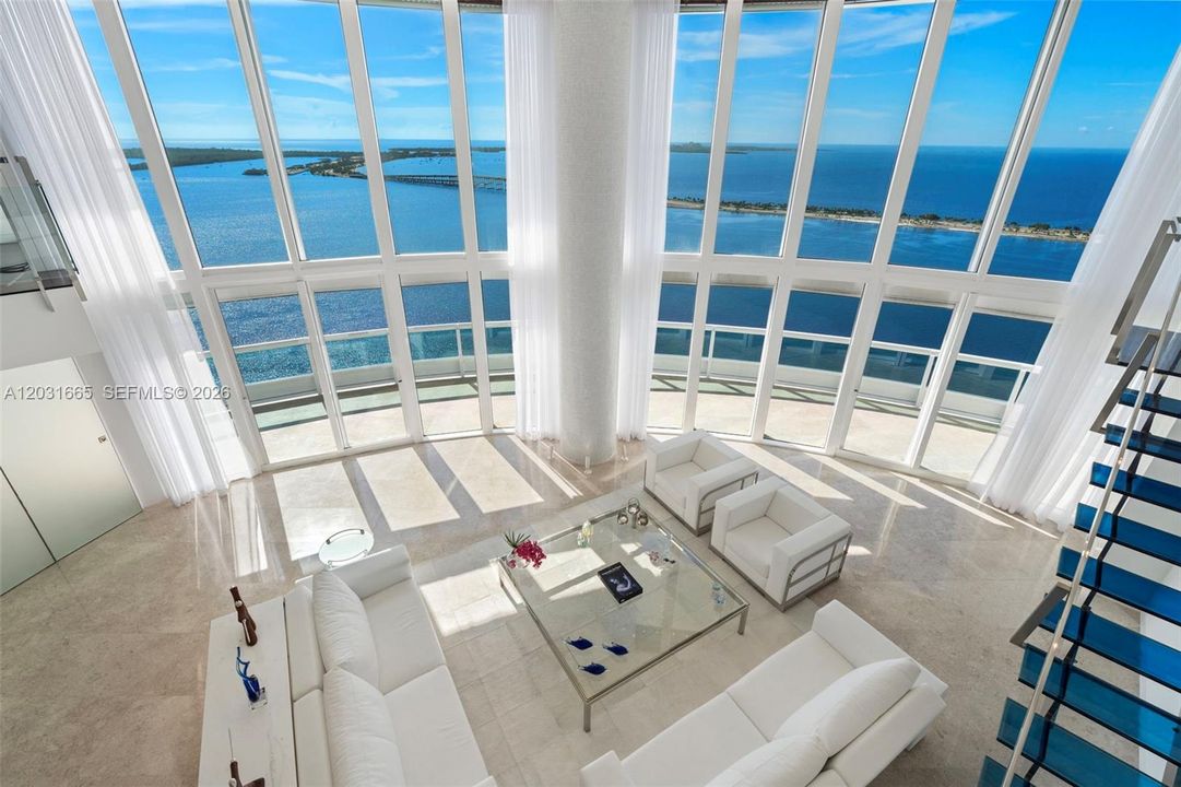 Highest 2 level townhouse Living Room water views from second floor mezzanine