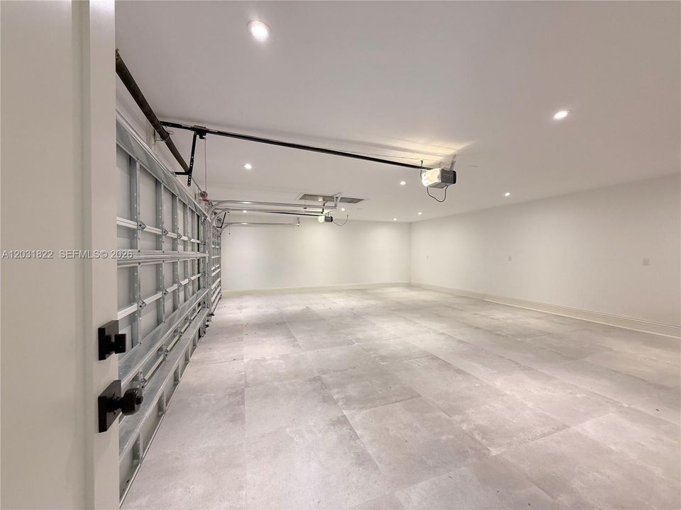 3 CAR GARAGE WITH TILE