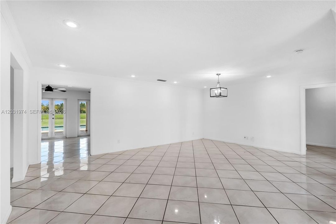 view of family room, the kitchen is off to the left