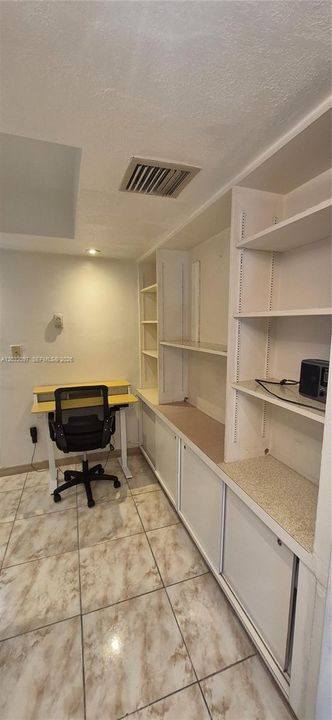 Next to the kitchen
