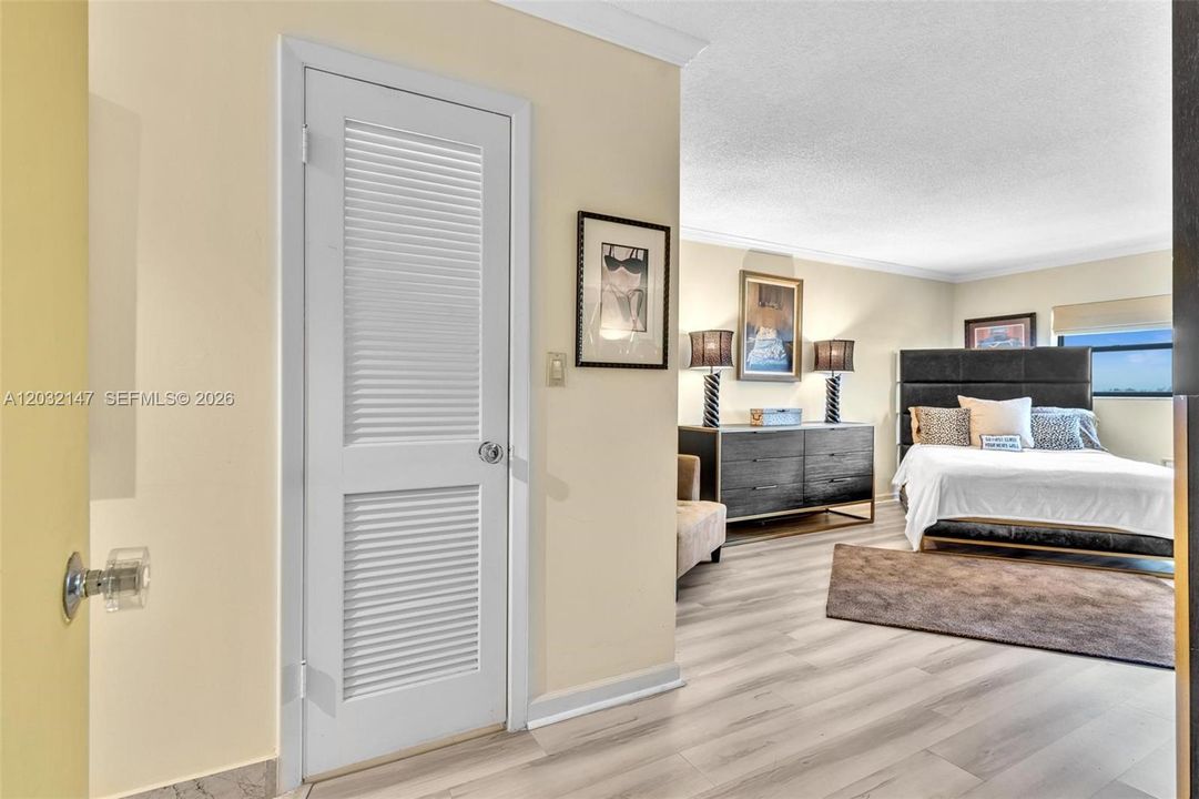 THE PRIMARY SUITE IS A WOW! IT IS HUGE WITH LOTS OF NATURAL LIGHT, BEAUTIFUL VIEWS, A SEATING AREA, LARGE WALK IN CLOSET PLUS ANOTHER CLOSET, PRIMARY MARBLE BATHROOM, AND A DEDICATED LAUNDRY ROOM WITH EXTRA STORAGE!