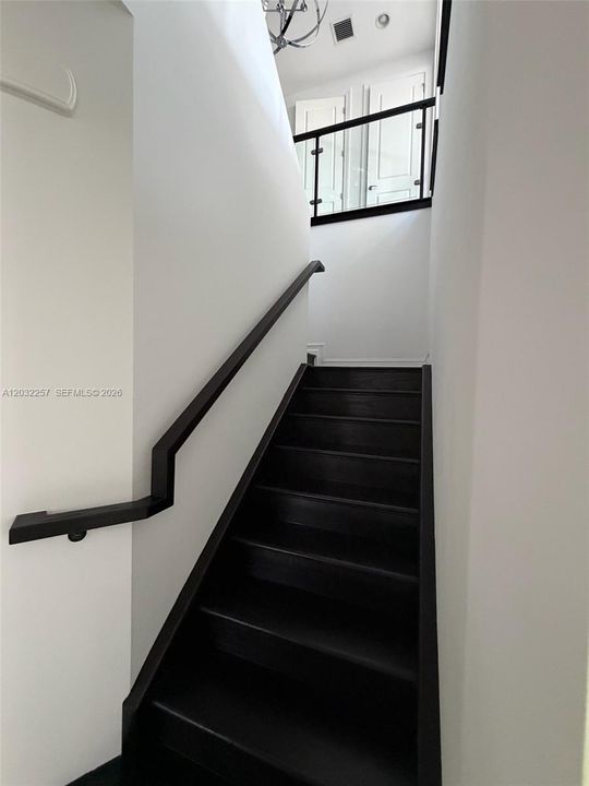 WOOD STAIRS TO SECOND FLOOR