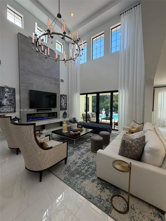 BEAUTIFUL HIGH WINDOWS SURROUND THIS GREAT ROOM, PROVIDING GREAT LIGHT THROUGHOUT.