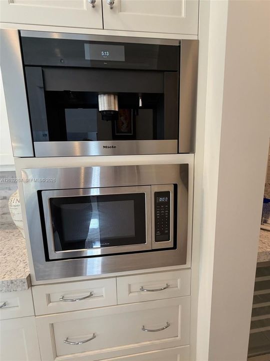 MIELE ESPRESSO/COFFEE SYSTEM AND MICROWAVE.