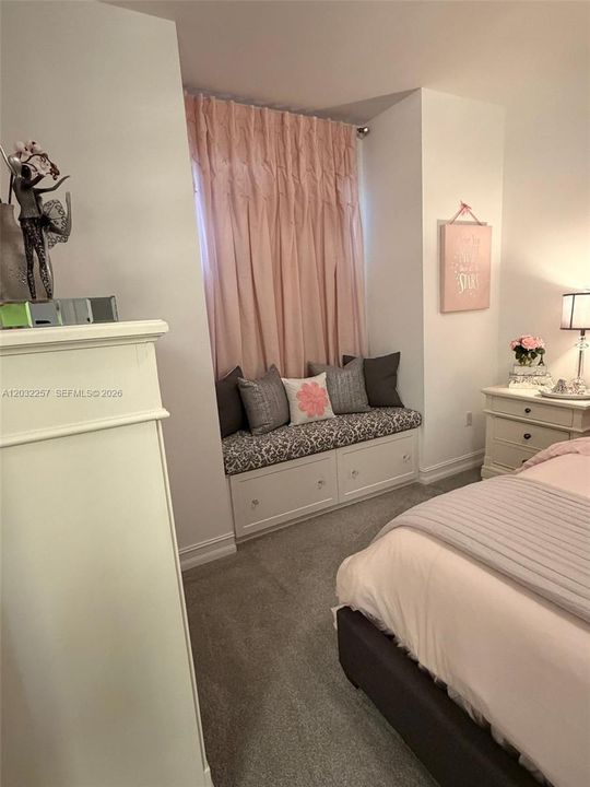 BEDROOM #3 HAS A CUSTOM SITTING BENCH WITH STORAGE