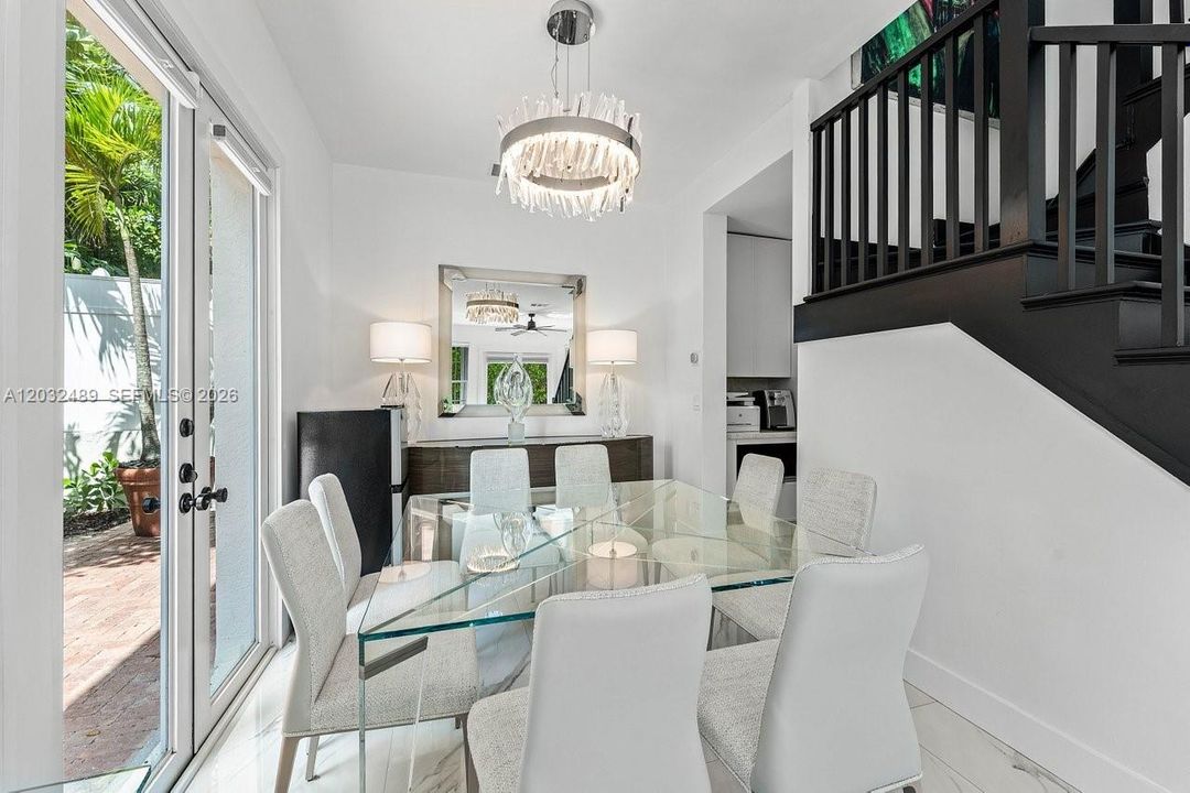 Formal dining room opens to rear garden  - courtyard for outside dining