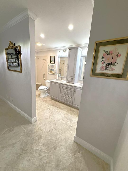 Master bath in master bed
