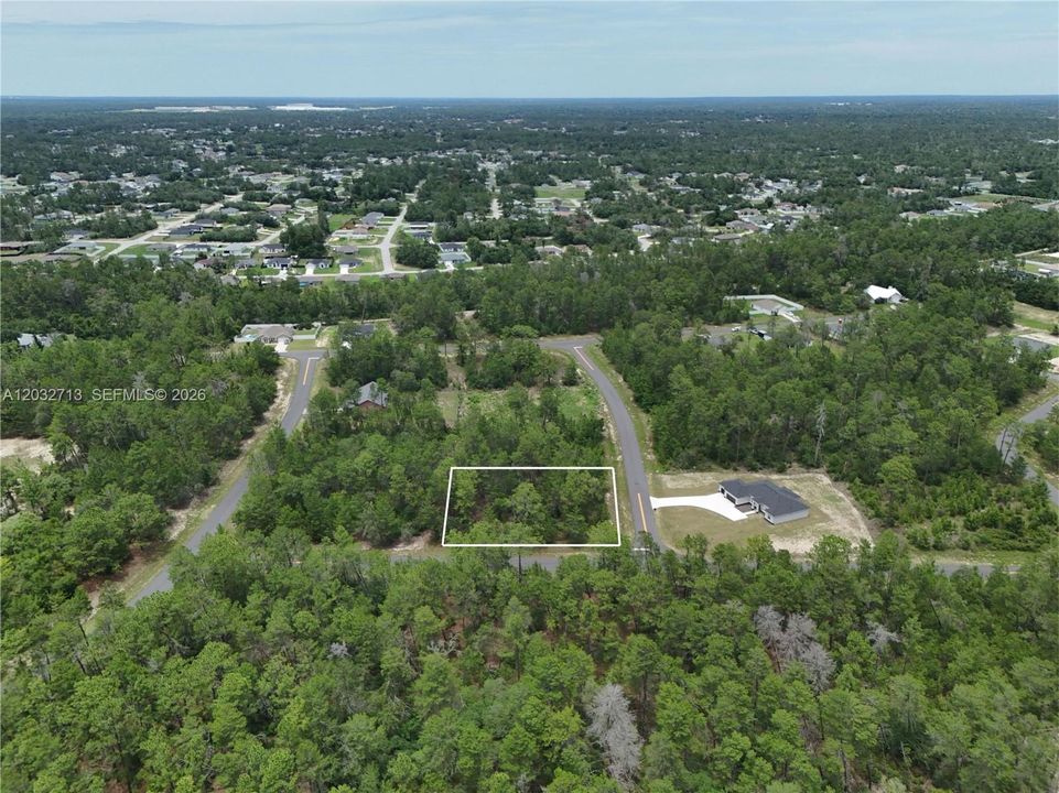 На продажу: $70,000 (0.58 acres)