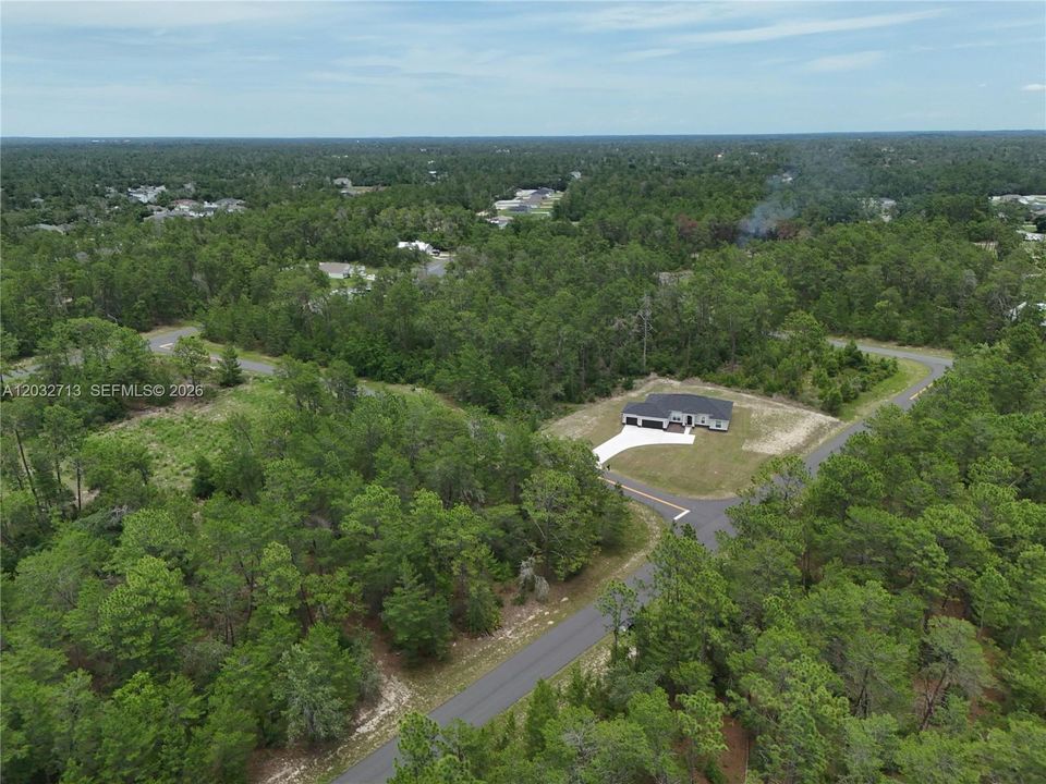 На продажу: $70,000 (0.58 acres)