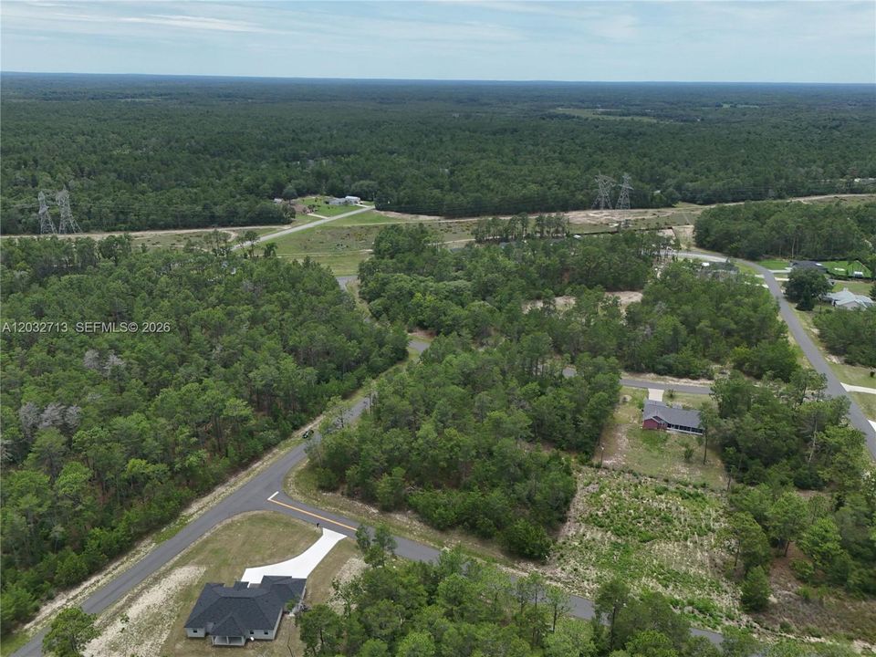 На продажу: $70,000 (0.58 acres)