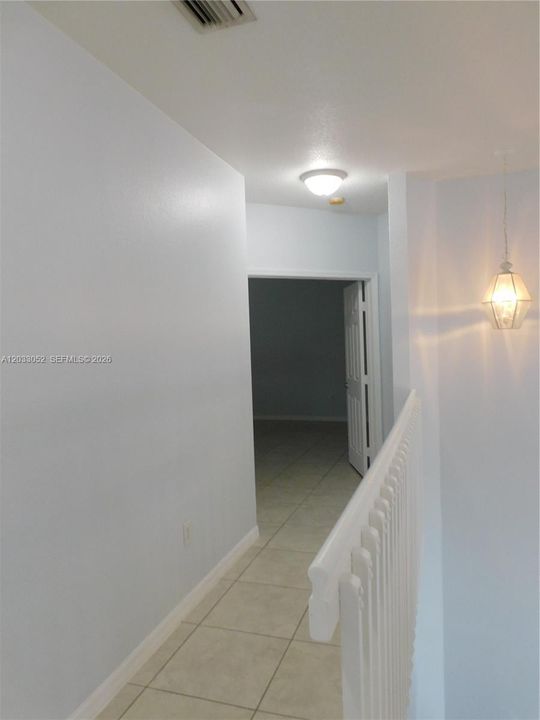 Hallway leading to Primary bedroom.