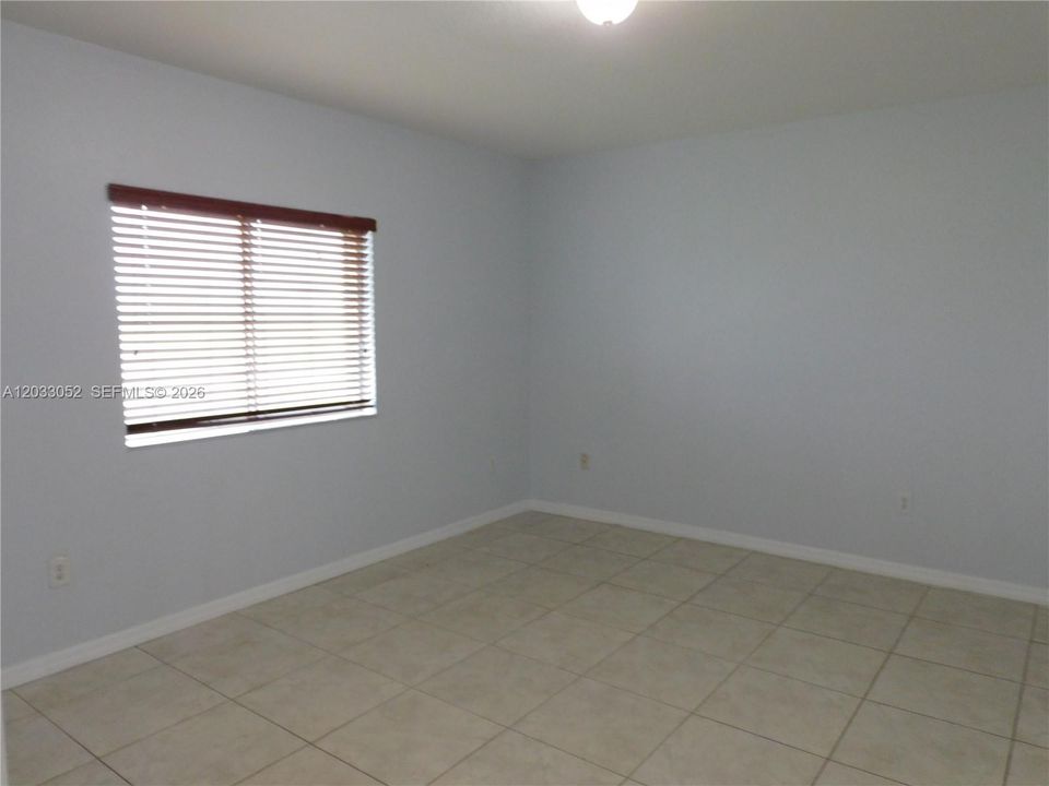 Primary bedroom view from entry way.