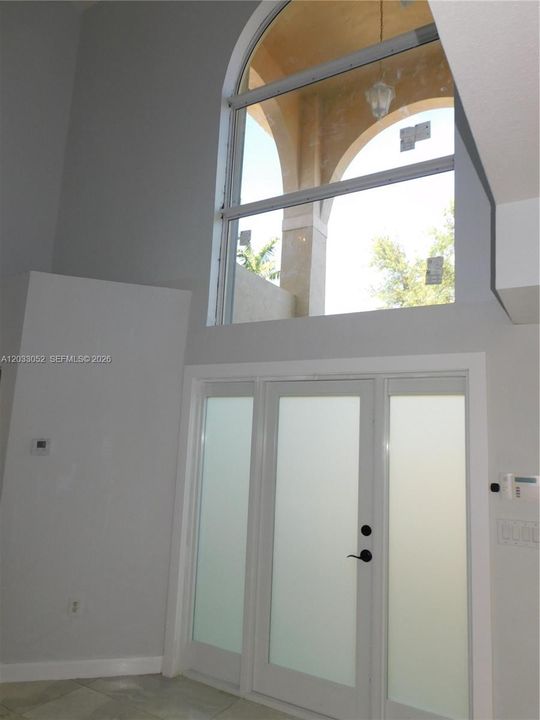 Entry door and window provide abundant light.