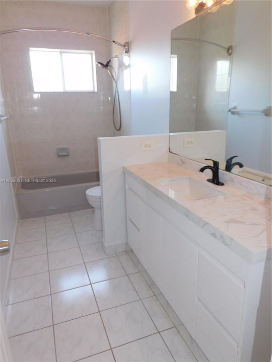 2nd bathrooms sits between both 3rd and 4th bedroom - updated vanity.