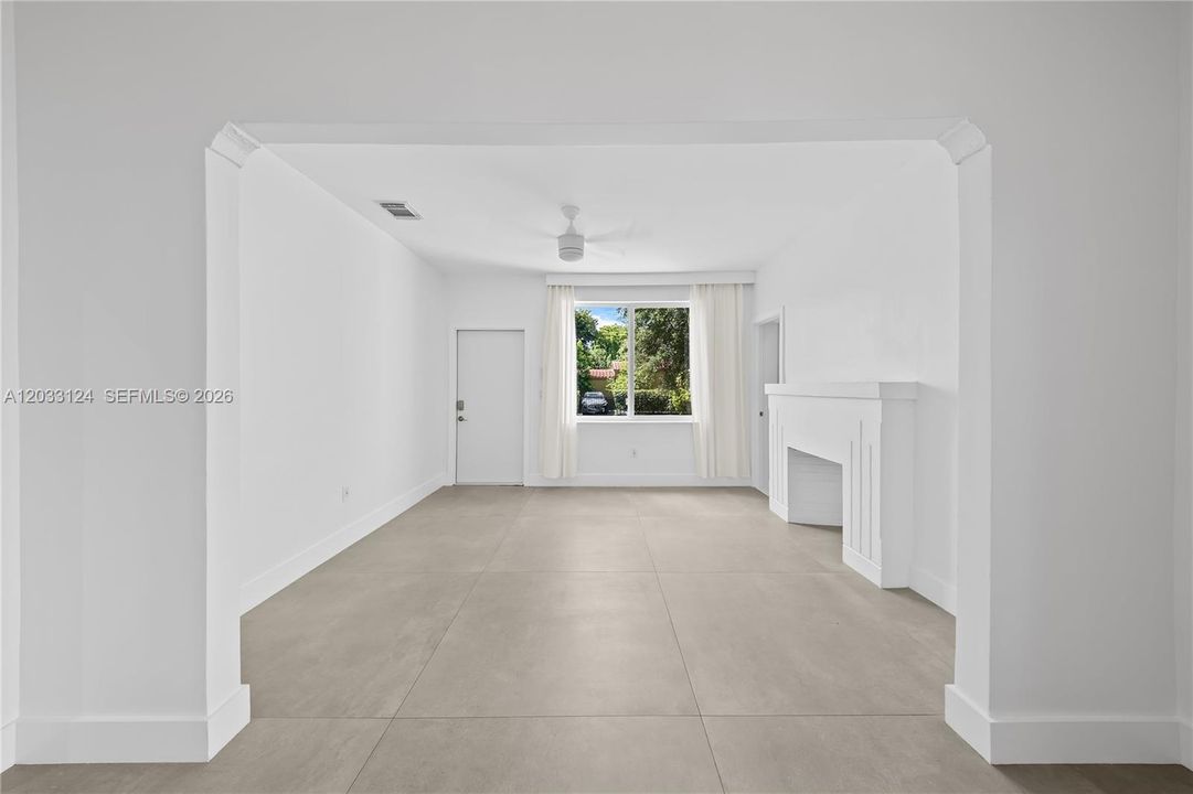Dining area looking into living room