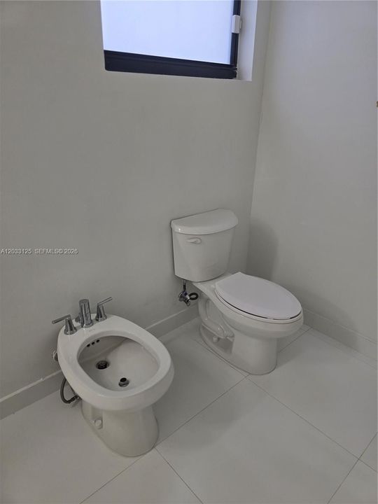Primary Bathroom Toilet & Bidet