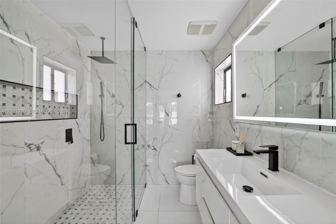 Dual head shower