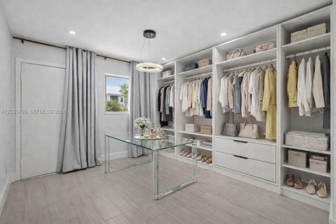 Virtually staged - can also be used as a walk in closet