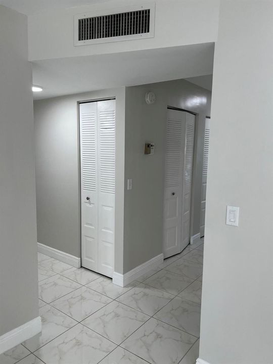 hallway toGUEST BDR & guest bth