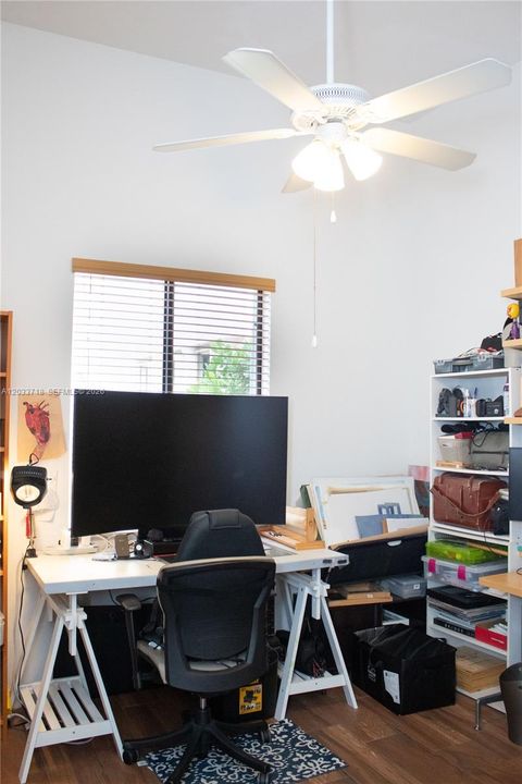 The Second Bedroom is currently used as a home office. ALL bedrooms have updated flooring, Wood-Look Tile including in the closets.