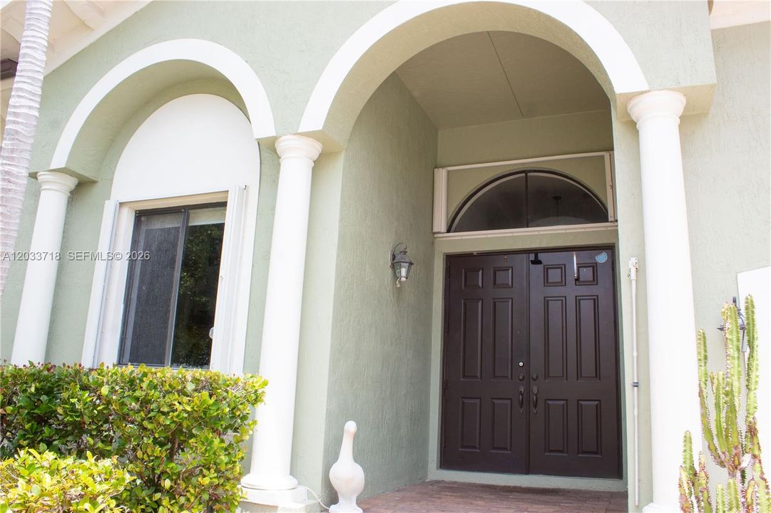 Accordion Shutters cover all openings of the home.