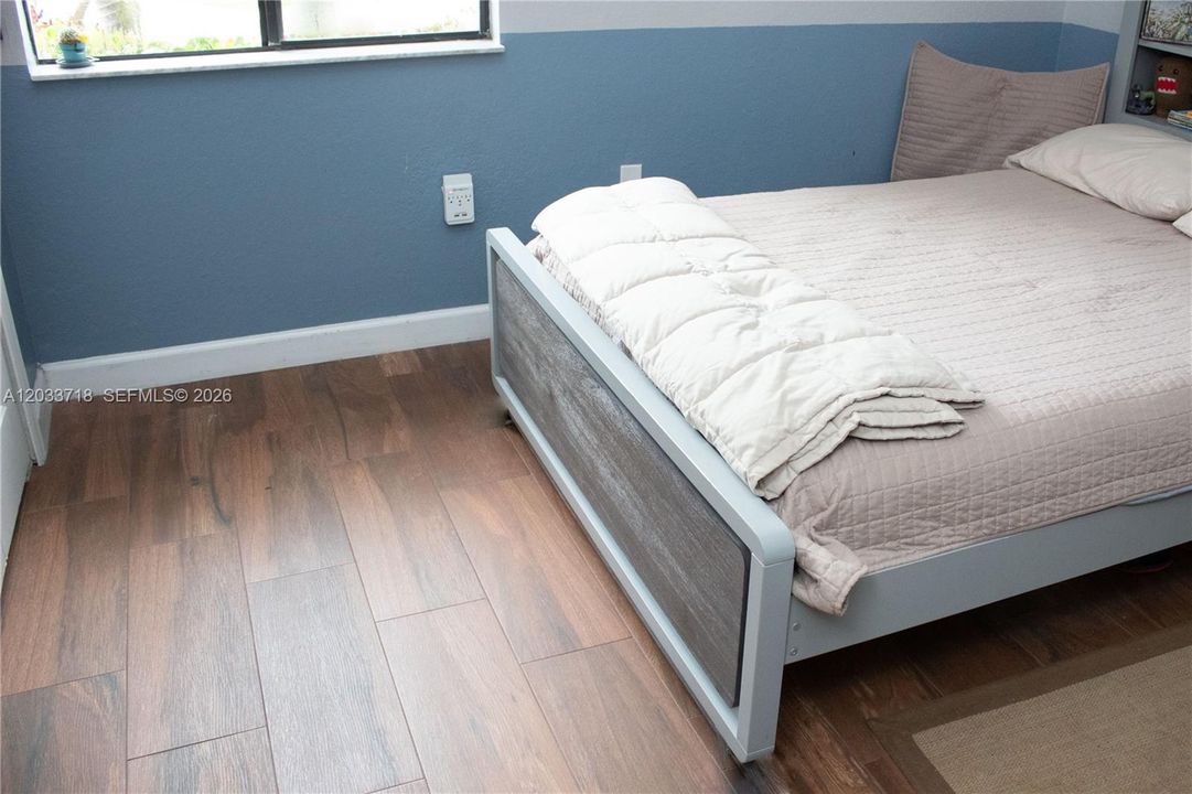 Beautiful and durable Wood-Look Tile has been installed in ALL bedrooms and closets