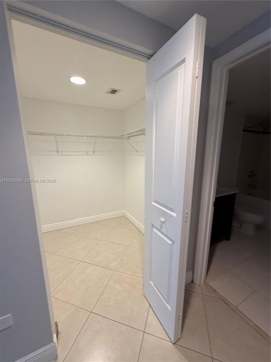 Walking closet in bedroom