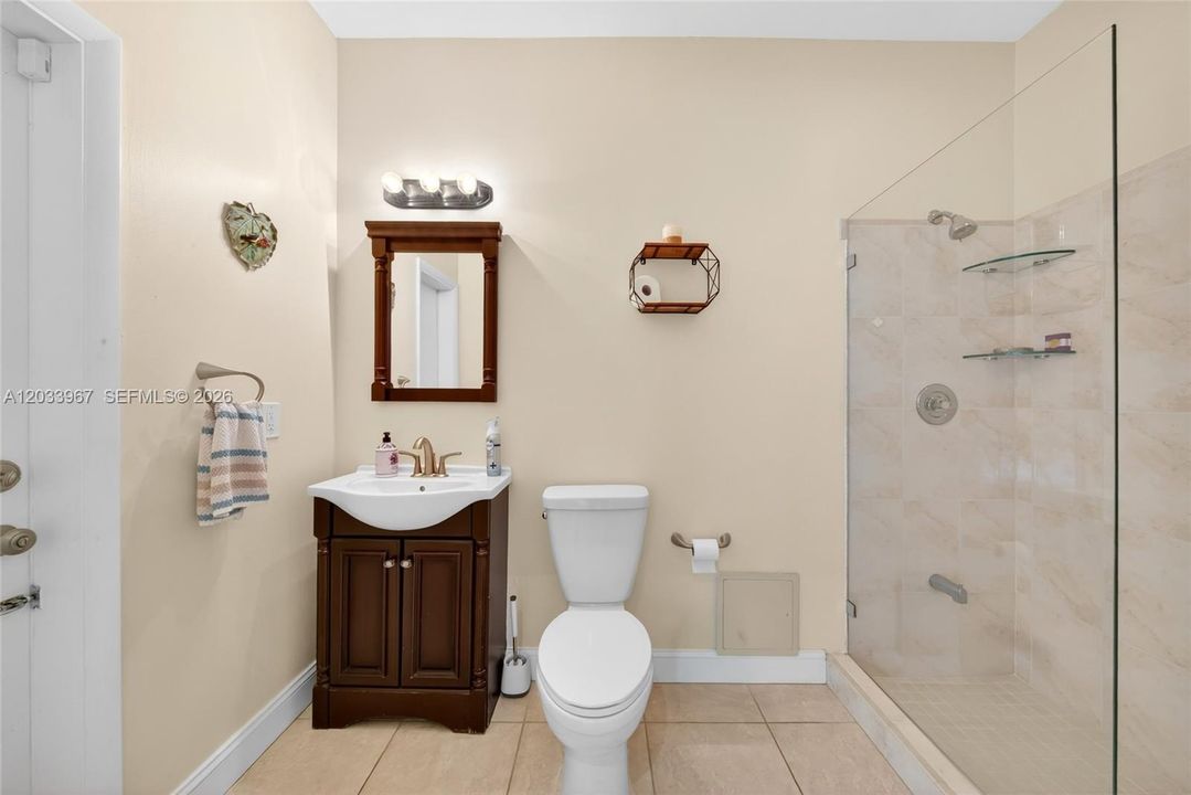 First Bathroom, located near Living Room