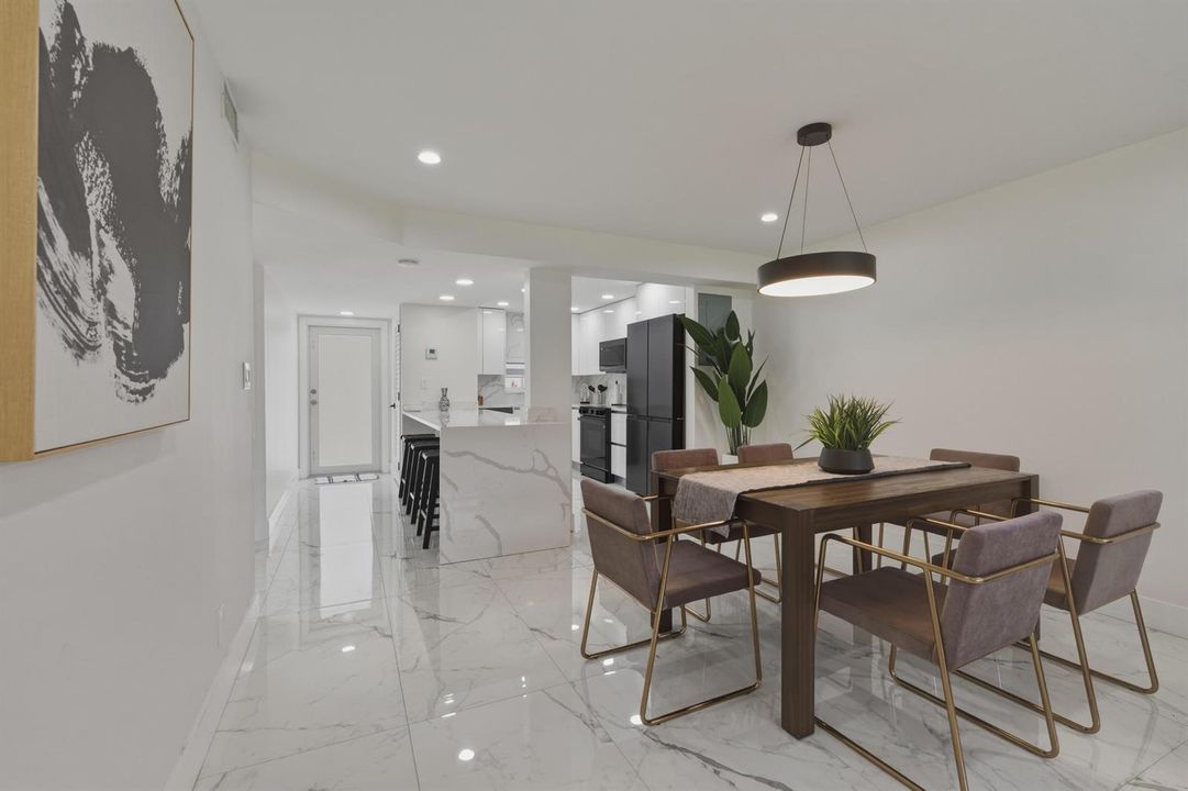 8. Dining Room to Kitchen and Front Door