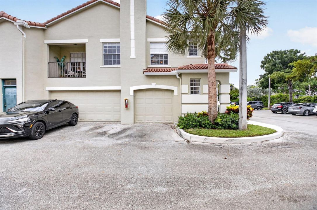 CORNER UNIT WITH PRIVATE 1-CAR GARAGE
