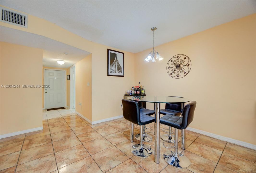 Dining area has it's own light fixture